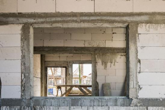 House under construction at building site