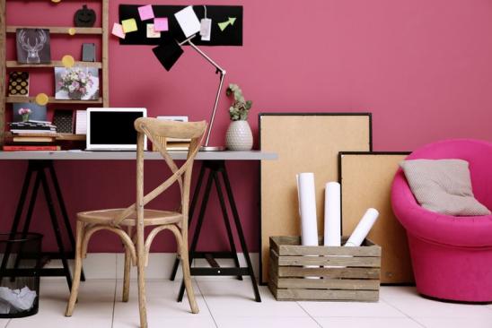 Workplace with laptop on table in modern room