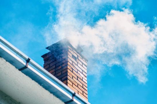Damaged chimney under fumes